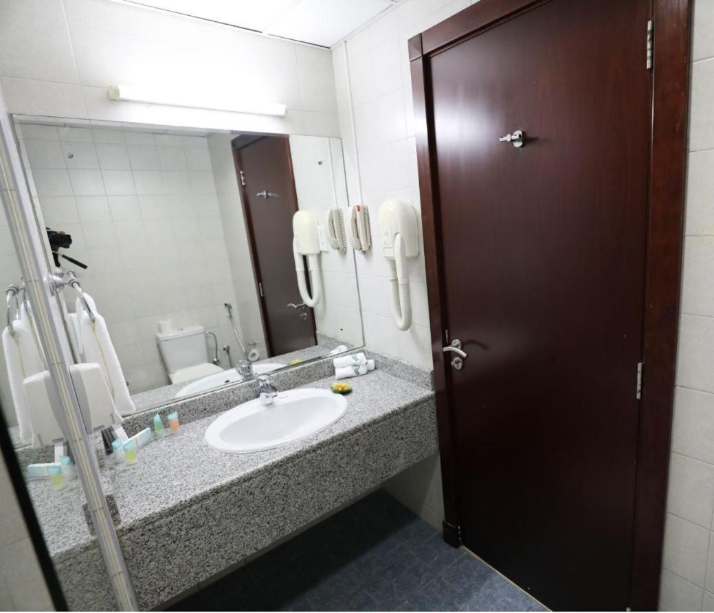 Parkside Hotel Apartment Дубай Экстерьер фото